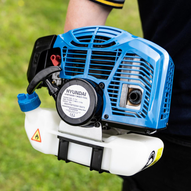 Hyundai HYMT5200X 5-in-1 petrol garden multi-tool in use