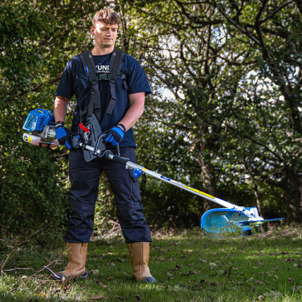 Hyundai HYMT5200X 5-in-1 petrol garden multi-tool in use
