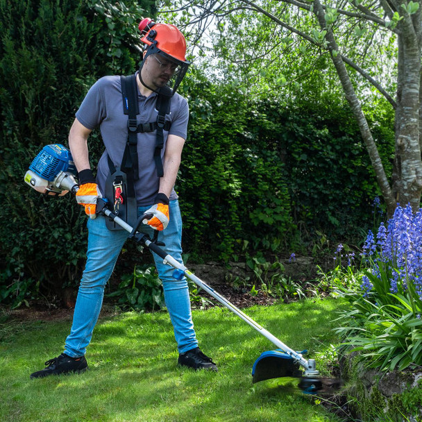 Hyundai HYMT5200X 5-in-1 petrol garden multi-tool in use